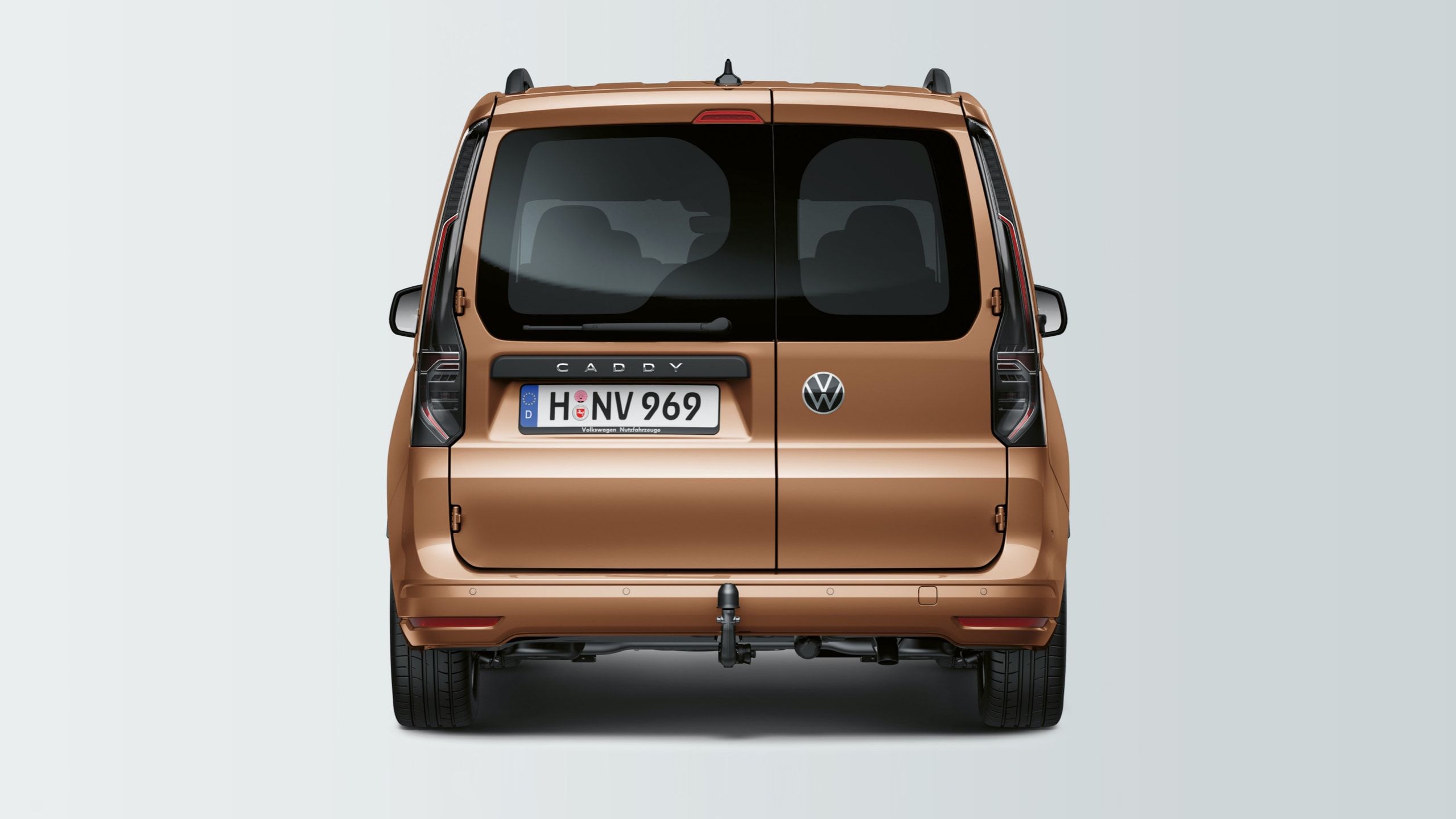 As portas traseiras vidradas com abertura lateral do novo Caddy
