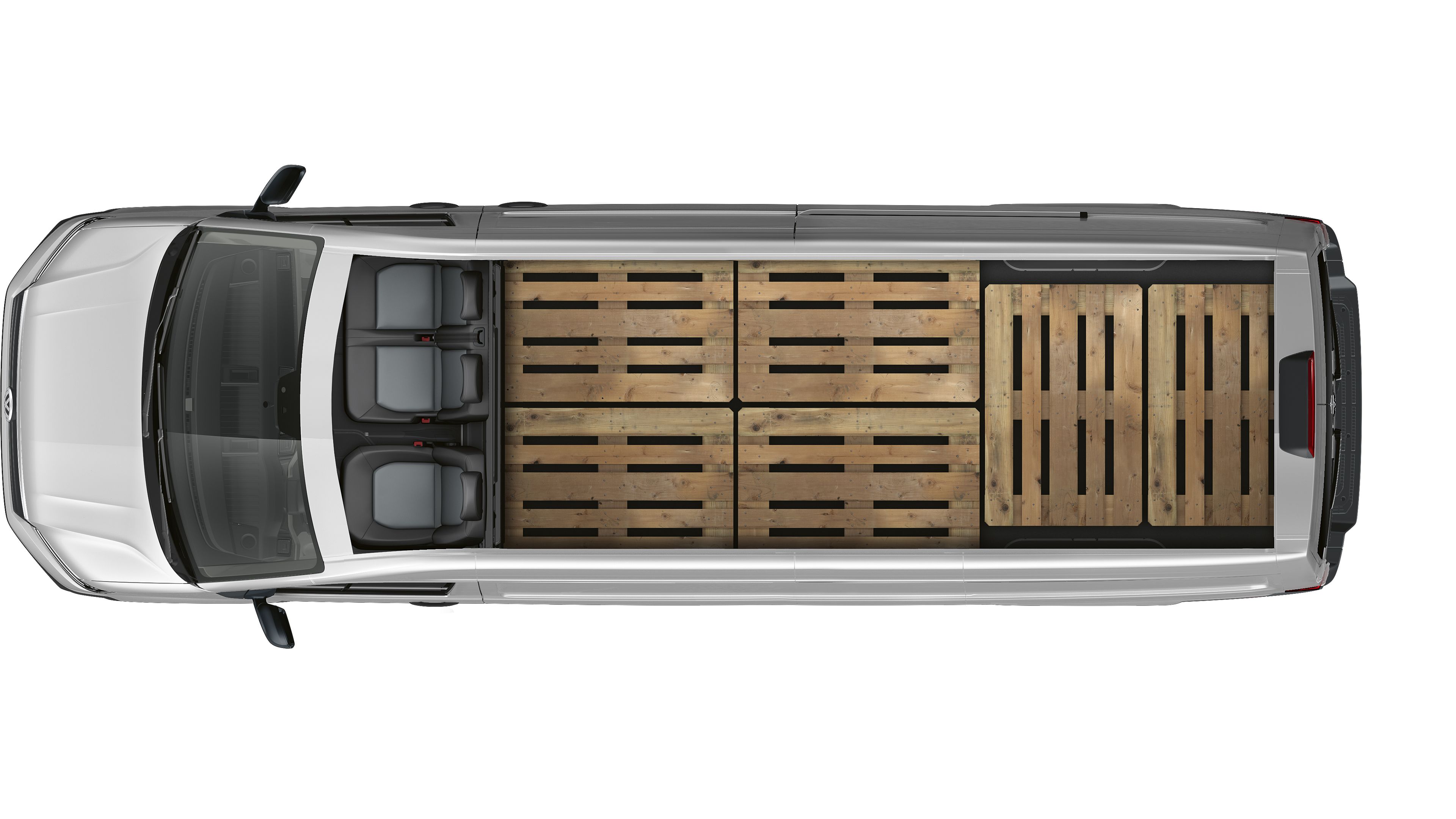 Visão de cima do interior do compartimento de carga do Volkswagen Crafter cargo. Seis europaletes estão dispostas lado a lado.