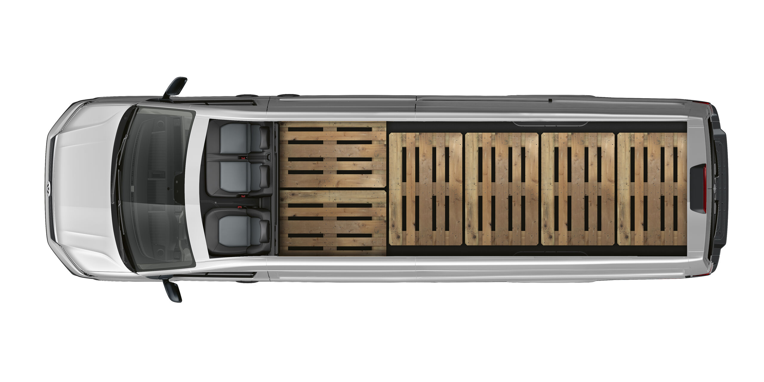 Visão de cima do interior do compartimento de carga do VW Crafter Cargo. Seis europaletes estão dispostas lado a lado.