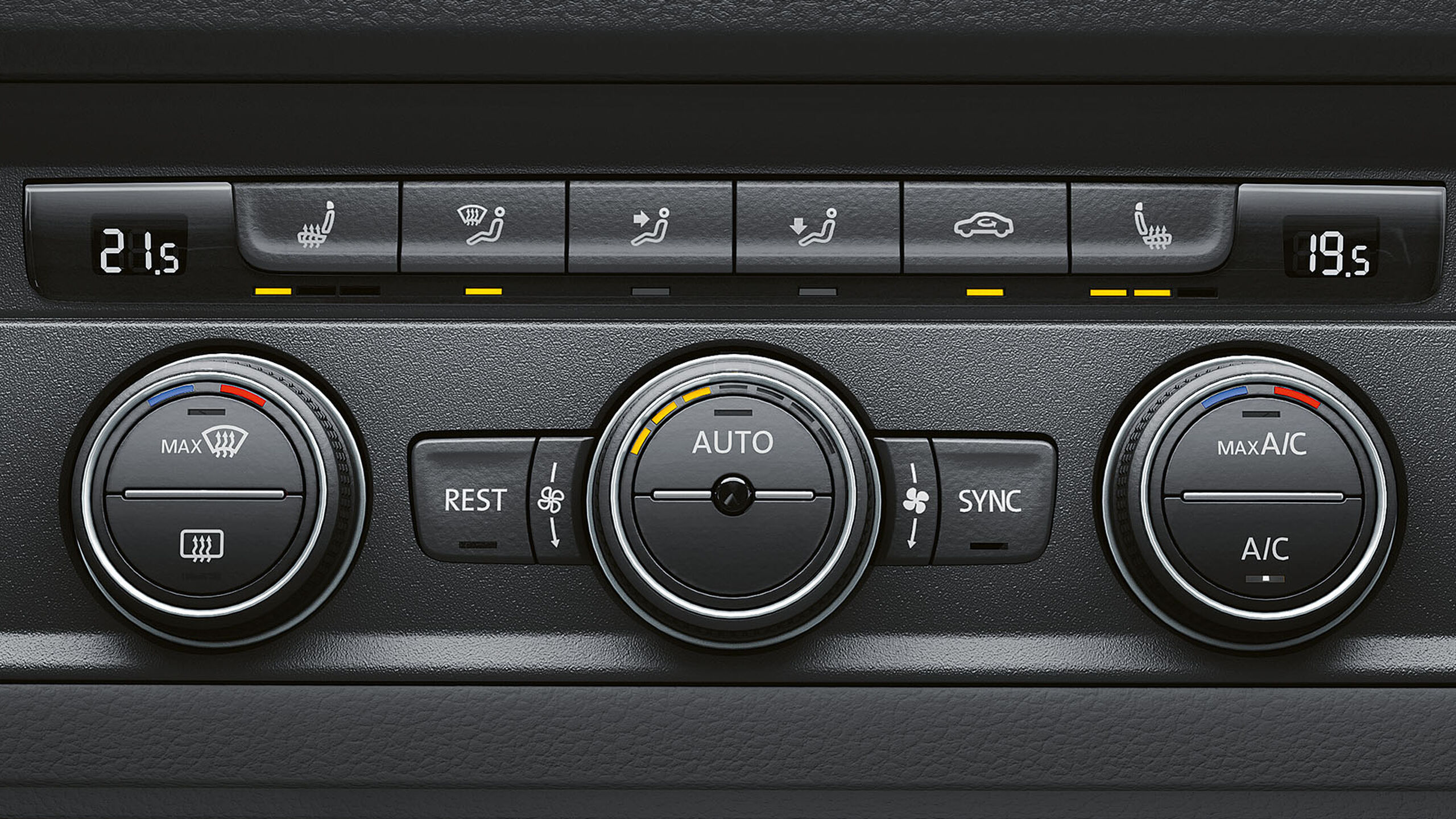 A ilustração mostra o sistema de ar condicionado "Climatronic" com práticos botões de controlo.